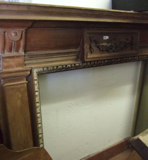 Appraisal: A th century pine fire surround the breakfront top over