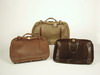 Appraisal: LUGGAGE - Lot of three soft side designer suitcases by