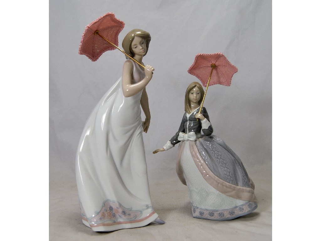 Appraisal: Two Lladro figures 'Sombrilla en Alto' no and 'Afternoon Promenade'