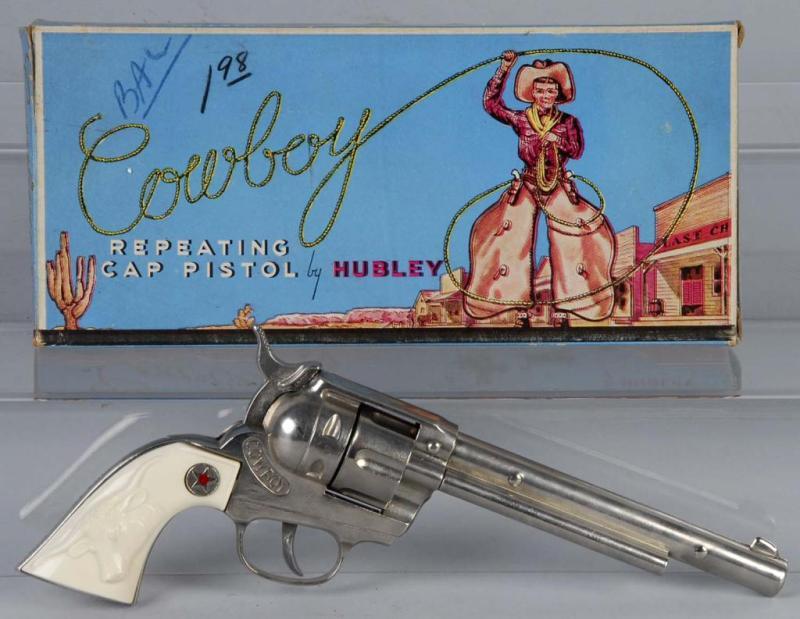 Appraisal: Hubley Cowboy Cap Gun Description Includes box which is missing