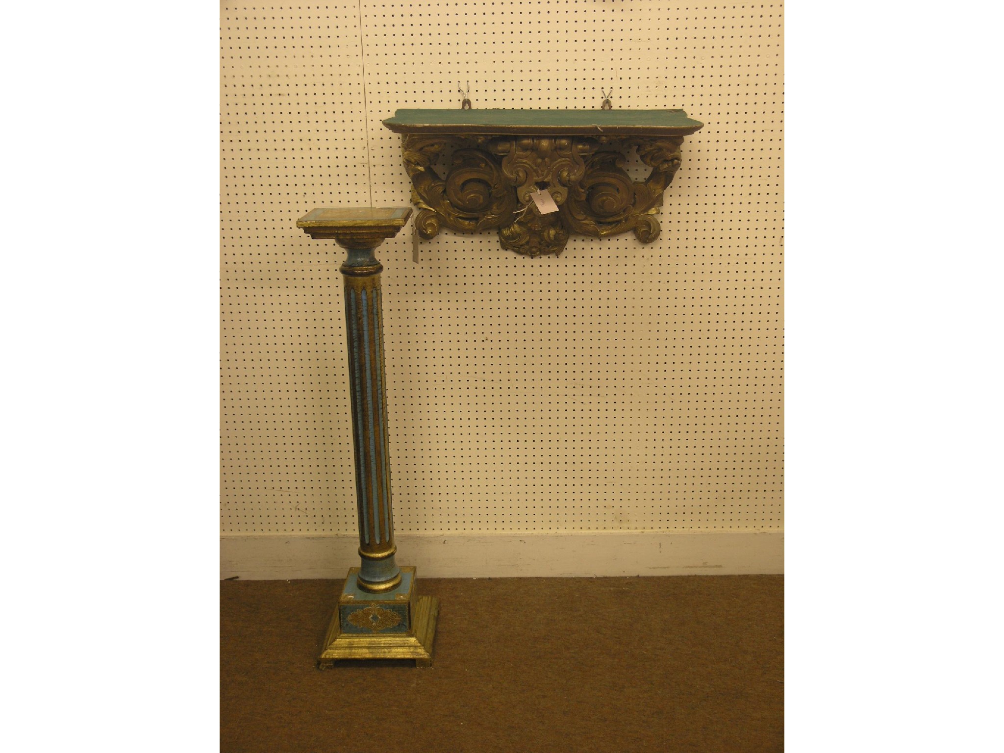 Appraisal: A French period-style moulded gilt wall bracket serpentine-shape with double-scroll