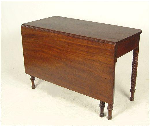 Appraisal: MAHOGANY SHERATON DROP LEAF TABLE Butterfly veneered top with apron