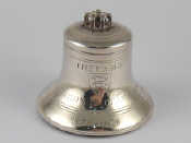 Appraisal: A silver table bell in the form of a church