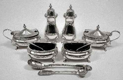 Appraisal: A George V silver rectangular eight piece condiment set with