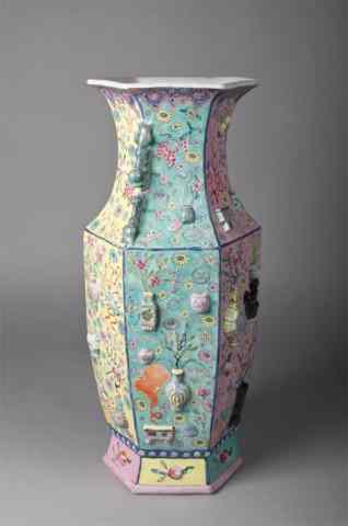 Appraisal: Chinese Qing Famille Rose Porcelain VaseFinely molded to depict one