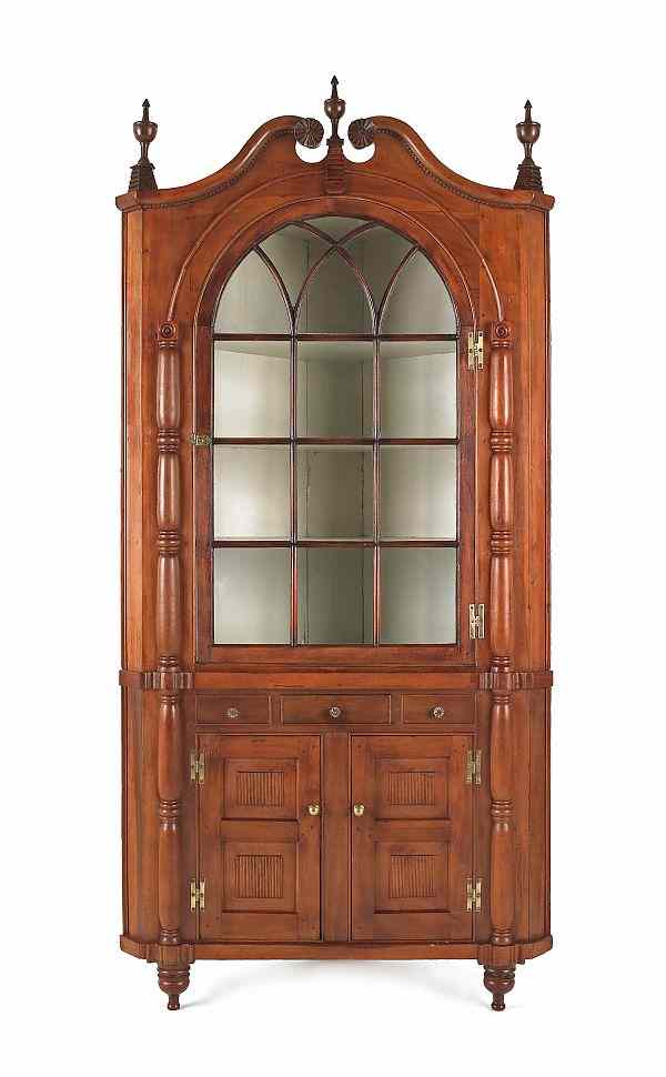 Appraisal: Pennsylvania two-part poplar corner cupboard ca h w