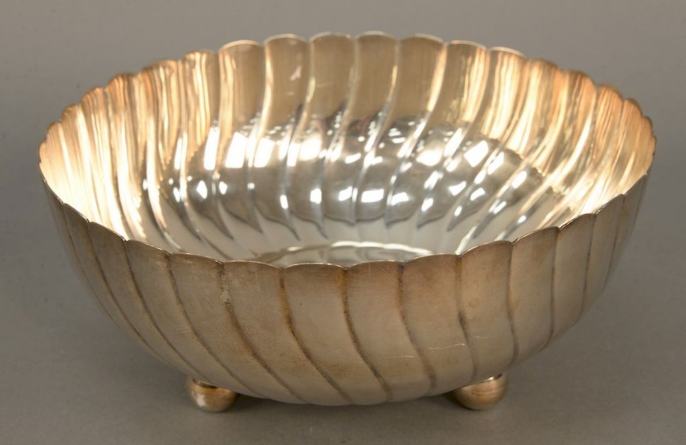 Appraisal: Mexican sterling footed bowl having scallop sides on three ball