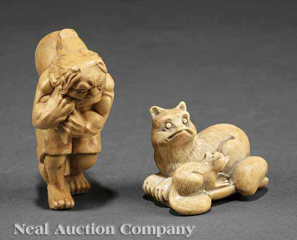 Appraisal: Two Japanese Ivory Netsuke probably Meiji Period - the first