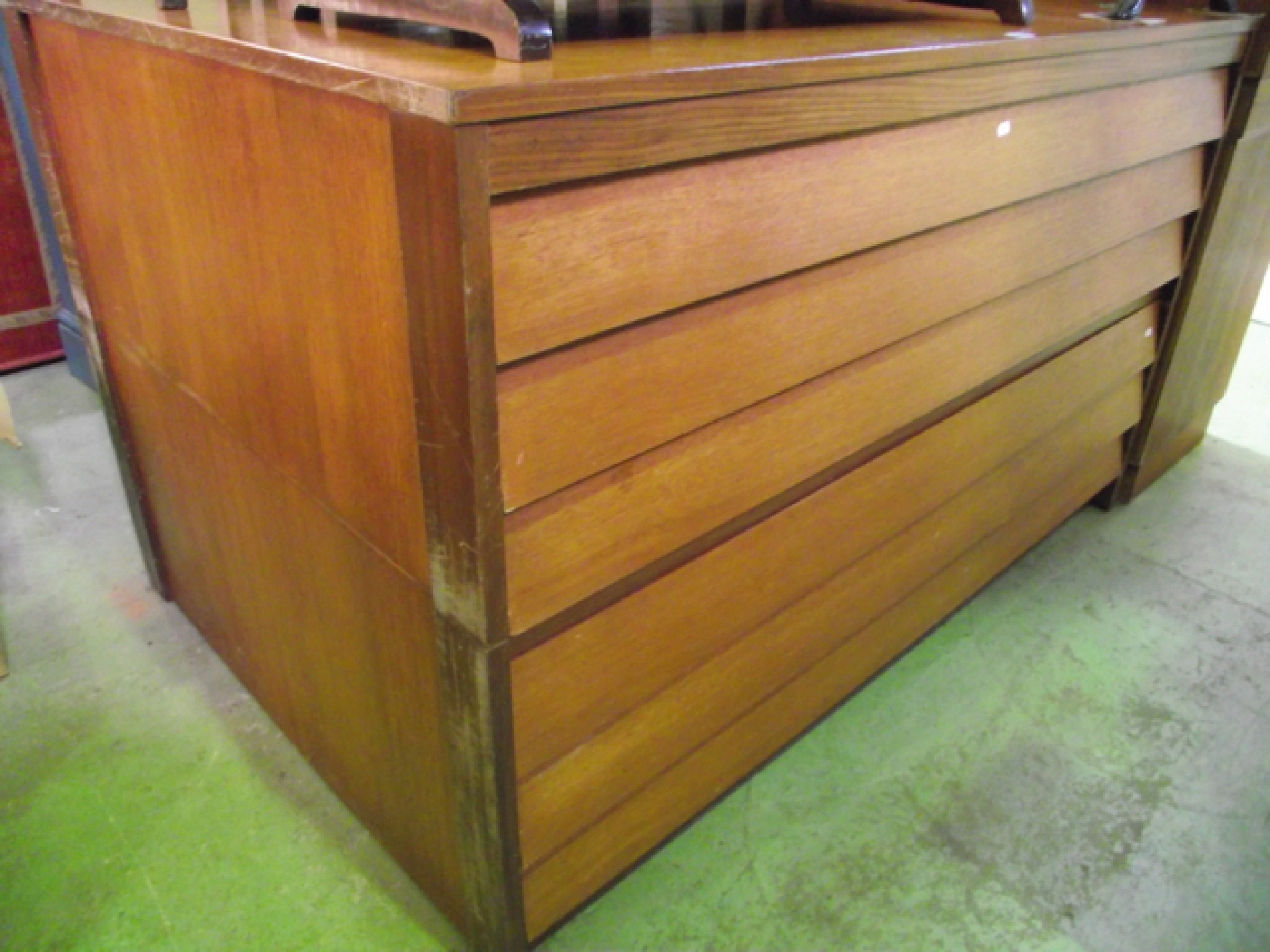 Appraisal: A teakwood plan map chest fitted with six drawers cm