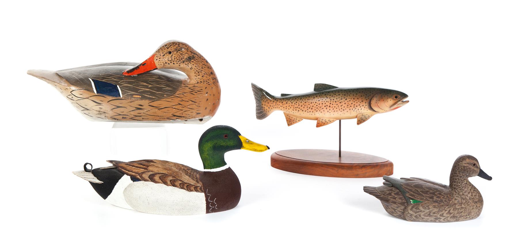 Appraisal: FOUR AMERICAN DUCK AND FISH CARVINGS Second half- th century