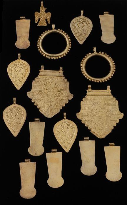 Appraisal: SIXTEEN PENDANTS Most stamped Provenance Property from the Collection of