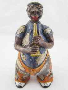 Appraisal: A well modelled humorous 's Cuban ceramic figure of a