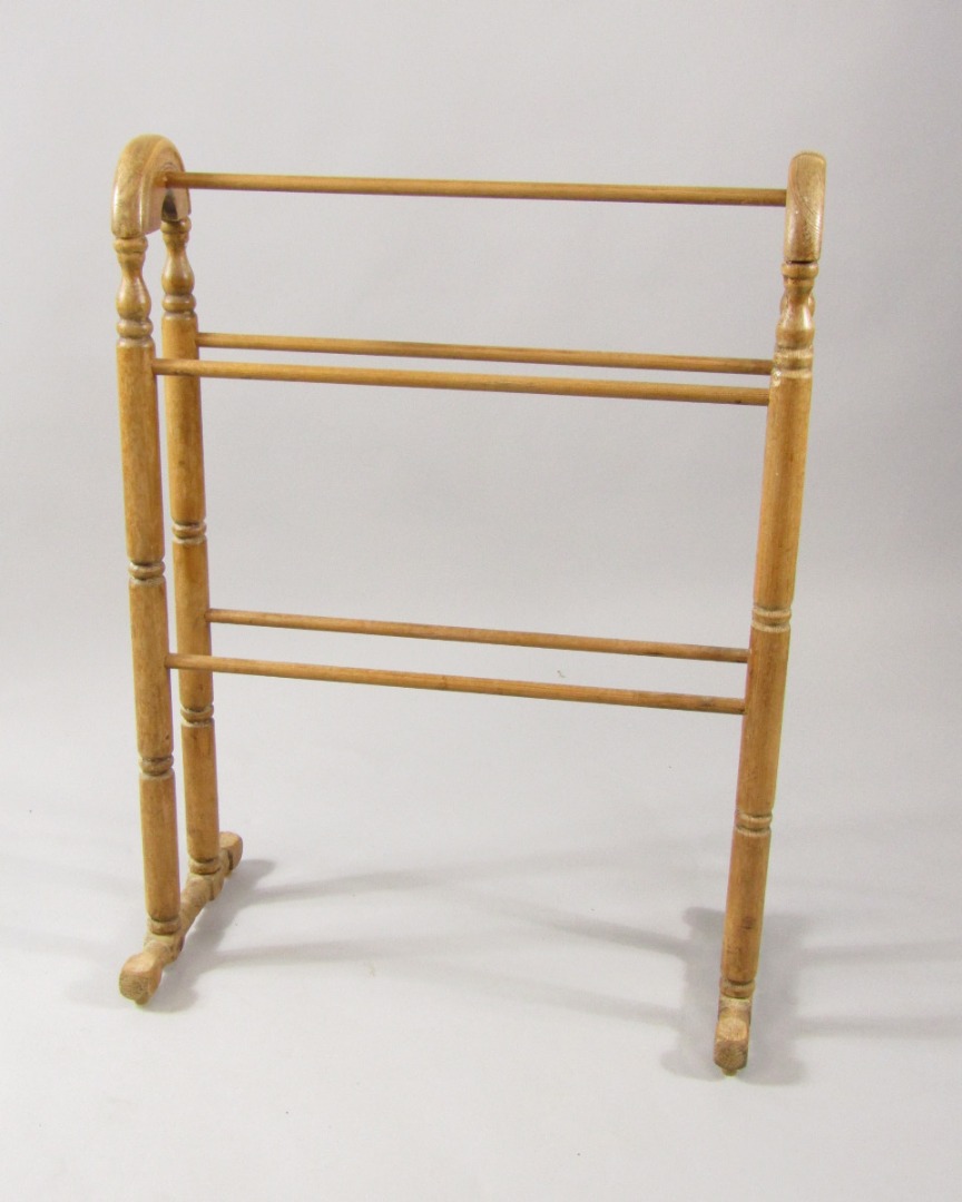 Appraisal: A Victorian pine towel rail cm long