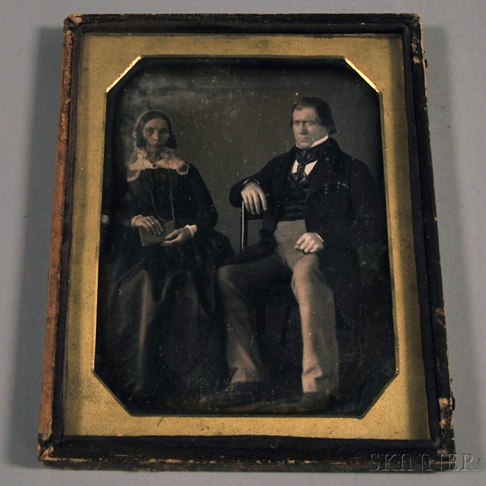 Appraisal: Half-plate Daguerreotype Portrait of a Seated Couple in a pressed-paper