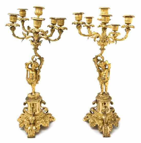 Appraisal: A Pair of Continental Gilt Bronze Figural Six-Light Candelabra each