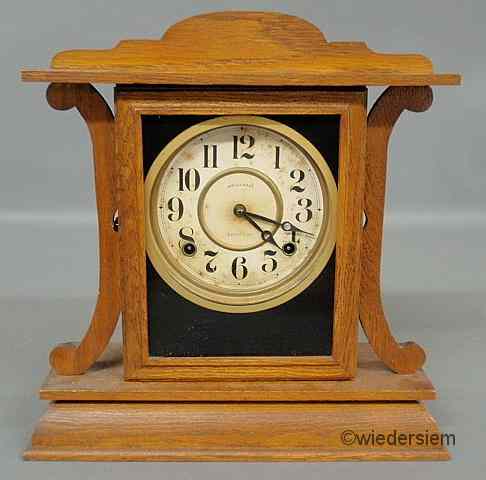 Appraisal: Oak cased eight-day mantel clock by Ingraham ''h x ''w