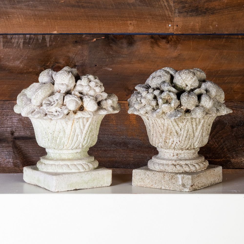 Appraisal: Pair of Cast Stone Fruit and Flower Filled Urns x