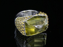 Appraisal: A Contemporary Design k Lemon Quartz Yellow Sapphire Ring designed