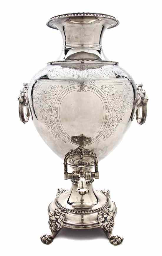 Appraisal: A Silverplate Tea Urn of baluster form with lion mask