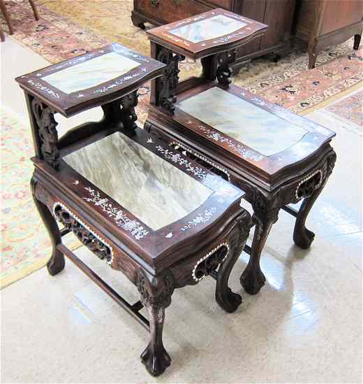 Appraisal: A PAIR OF CARVED AND INLAID ROSEWOOD STEP END TABLES