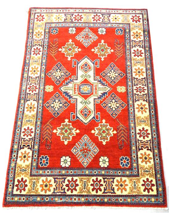 Appraisal: RUG Uzbek Kazak ' x ' red field with cream