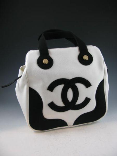 Appraisal: Chanel Black and White Canvas Tote with black Chanel Logo