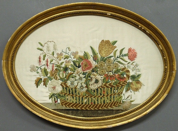 Appraisal: - Large oval English silkwork of a basket of flowers