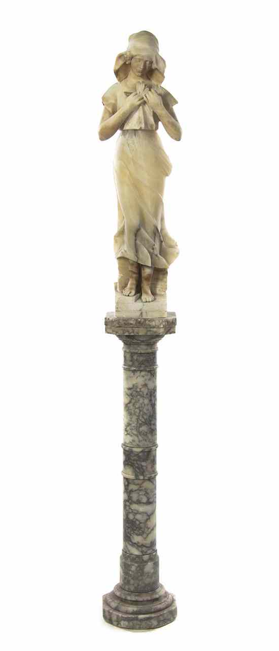 Appraisal: An Italian Alabaster Figure depicting a standing maiden clutching a