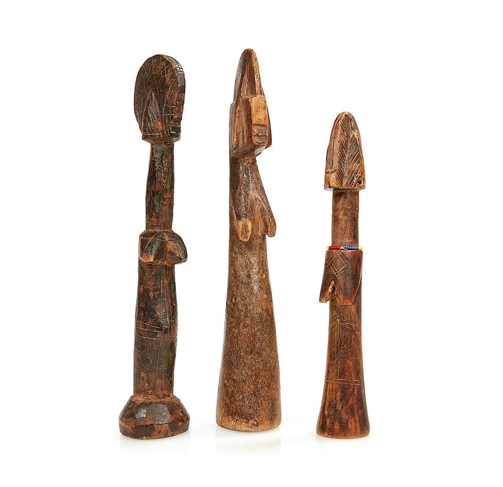 Appraisal: Three Mossi Dolls Three Mossi wood dolls comprising one with