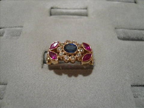 Appraisal: DIAMOND AND SAPPHIRE RING kt yellow gold diamond and sapphire