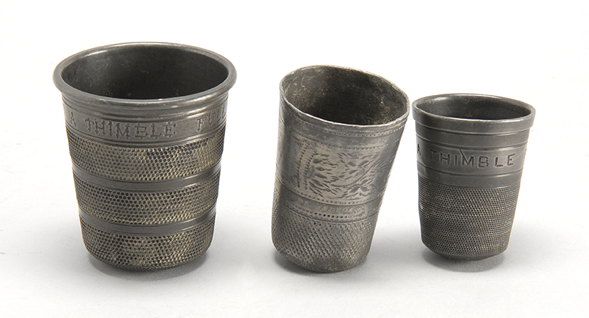 Appraisal: THREE UNUSUAL PEWTER THIMBLE-SHAPED MEASURES Scottish th CenturyTwo engraved Just