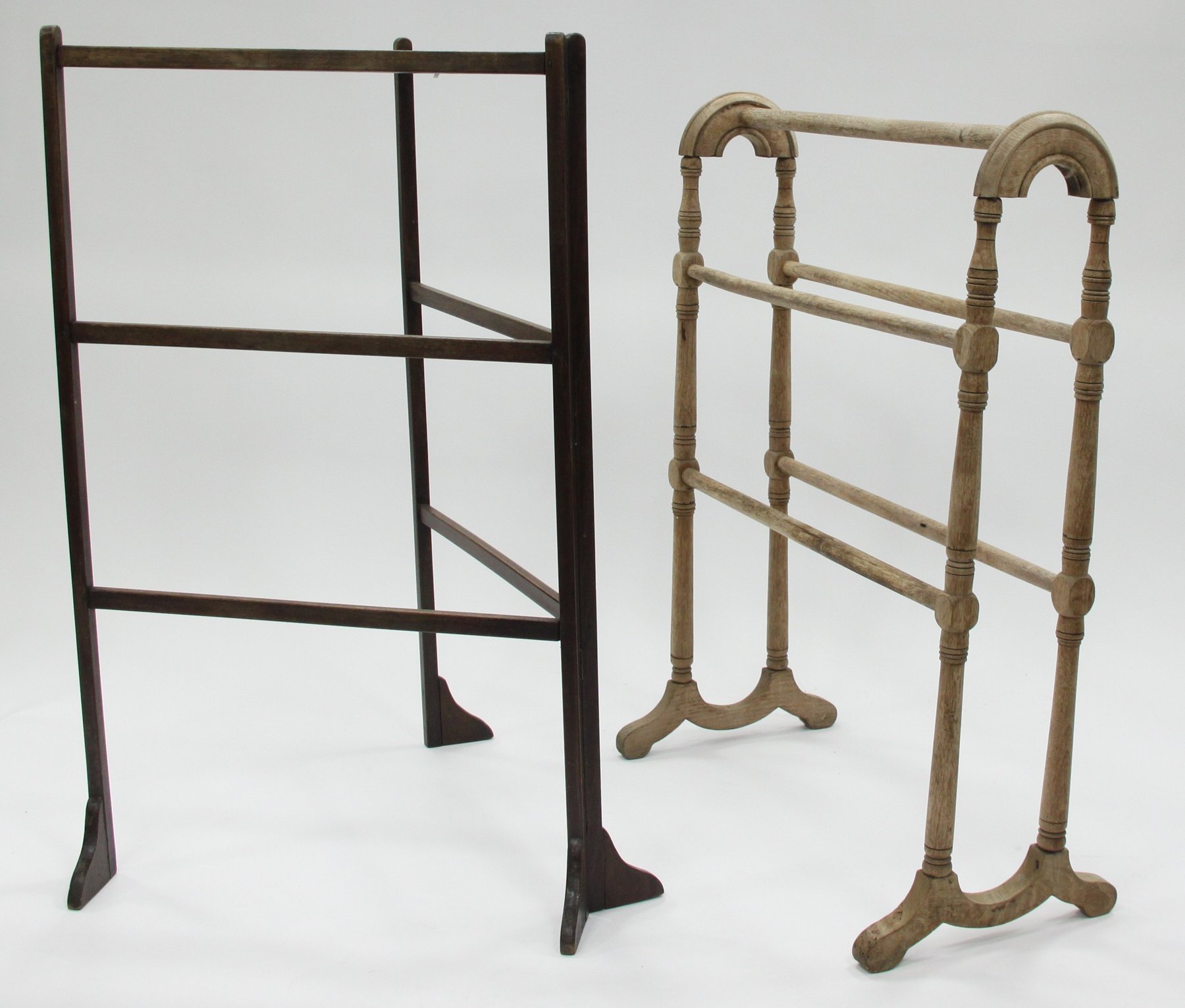 Appraisal: A turned wood towel rail on splay feet cm wide