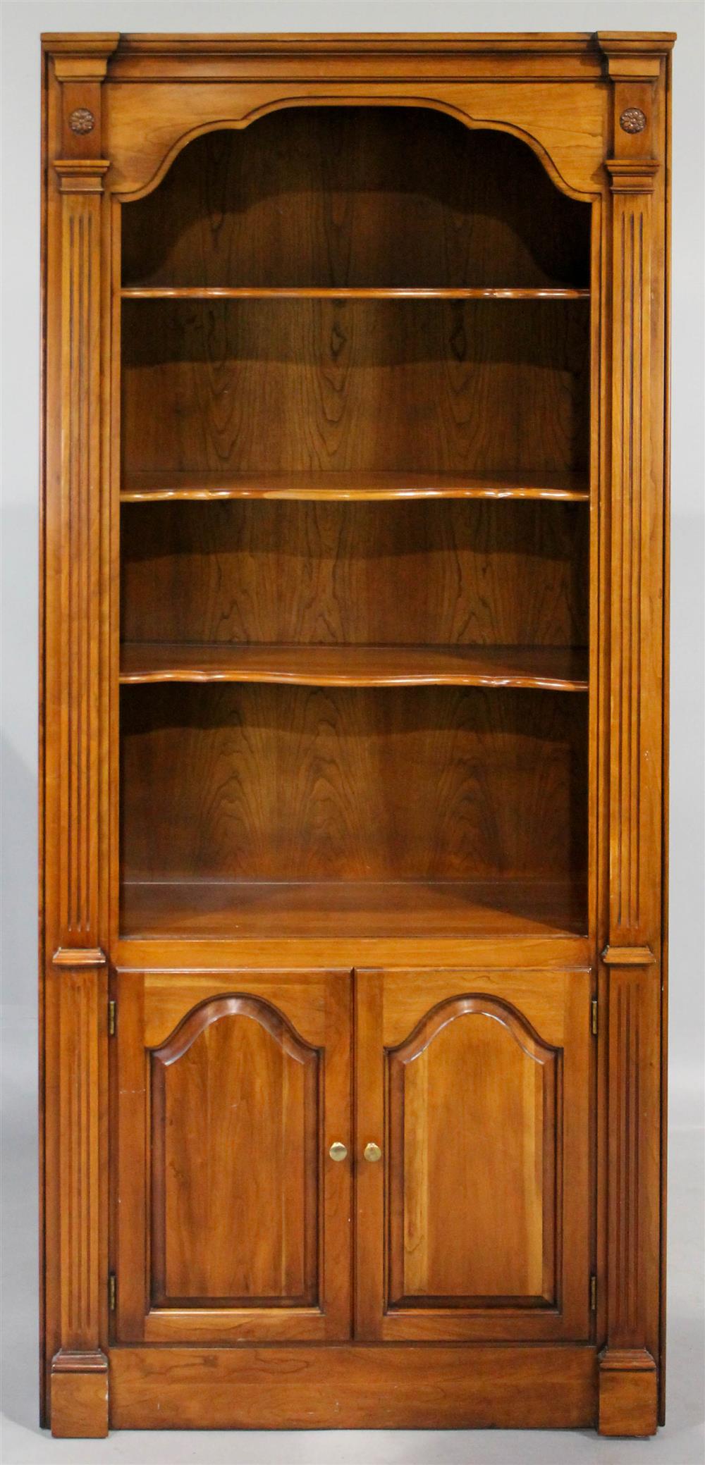 Appraisal: CHIPPENDALE STYLE MAHOGANY OPEN BOOKCASE having a molded straight pediment