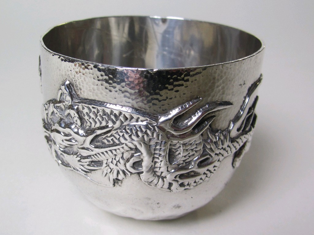 Appraisal: Oriental white metal bowl with dragon decoration