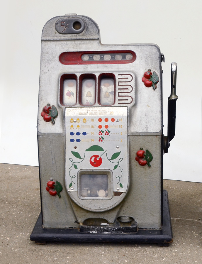 Appraisal: MILLS CHERRY FRONT CAST IRON SLOT MACHINE Circa 's cast