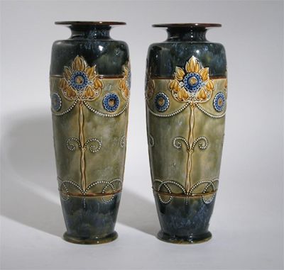 Appraisal: A pair of Royal Doulton stoneware vases tall shouldered form