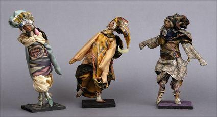 Appraisal: THREE FABRIC-CLOTHED WOOD MAQUETTES Variously garbed in fantasy costume studies