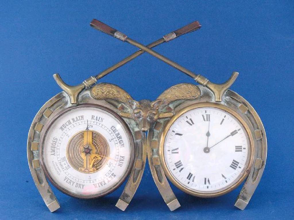 Appraisal: A CONJOINED CLOCK AND BAROMETER the brass case in the