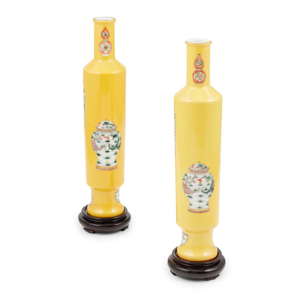 Appraisal: TWO YELLOW GROUND FAMILLE ROSE 'ANTIQUITY' TALL VASES QIANLONG MARK