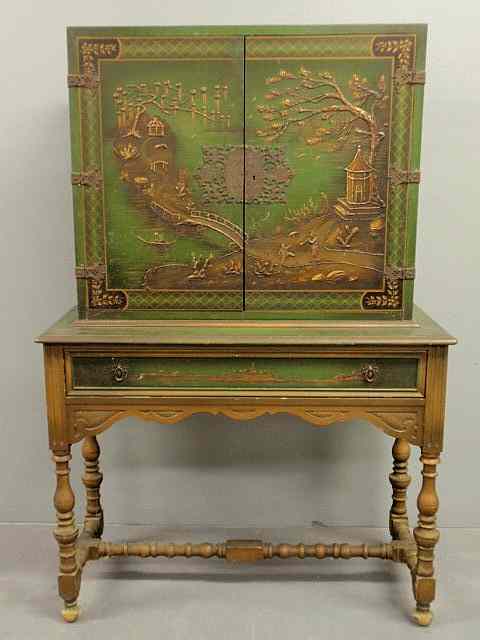 Appraisal: Green Japanned storage cupboard th c with turned legs and