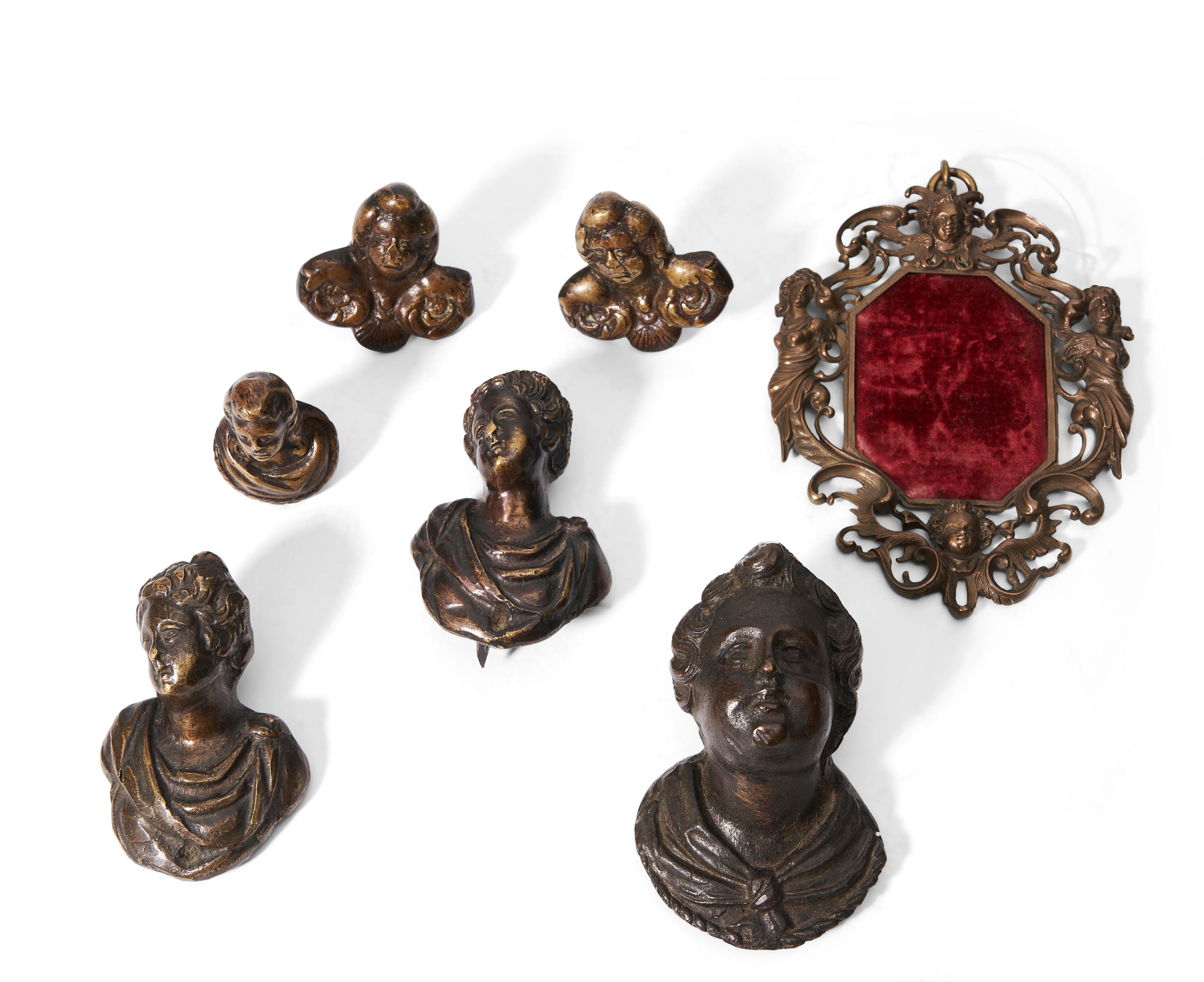 Appraisal: SIX FIGURAL BRONZE MOUNTS AND A SMALL CAST METAL FRAME