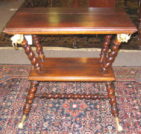 Appraisal: AMERICAN MAHOGANY TWO-TIER CENTER TABLE With rectangular molded top on