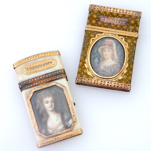 Appraisal: Two th C Souvenirs D'Amiti inset with glazed portrait miniatures