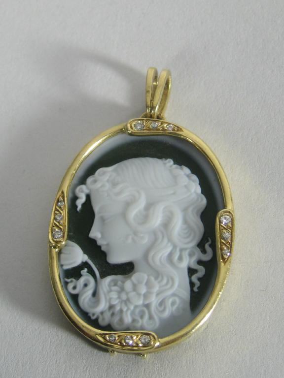 Appraisal: A Wedgwood Cameo Pendant the pre-raphelite style bust on green