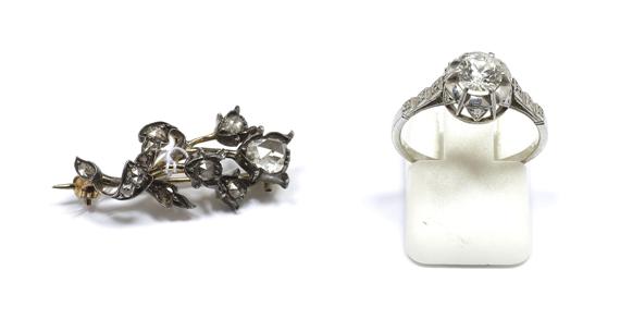 Appraisal: A DIAMOND RING and A DIAMOND BROOCH circa Platinum and