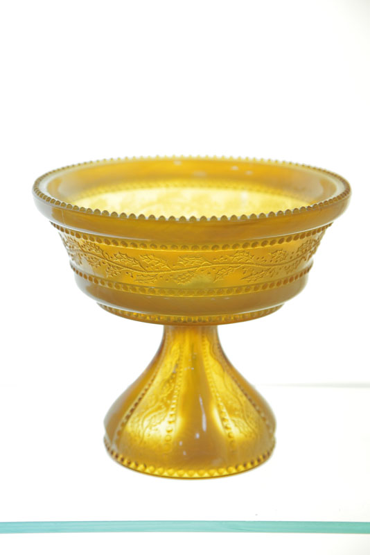 Appraisal: HOLLY AMBER GLASS COMPOTE By the Indiana Tumbler Goblet Co