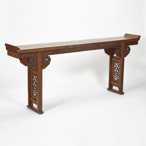 Appraisal: A Carved Elmwood Altar Table Republic Period The long single-panel