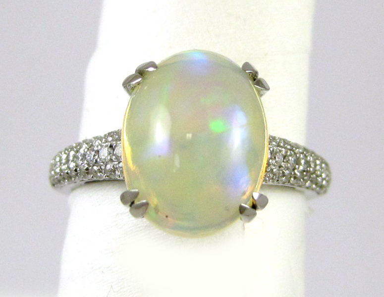 Appraisal: OPAL DIAMOND AND FOURTEEN KARAT GOLD RING The white gold