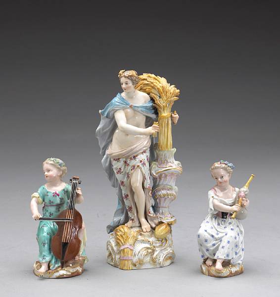 Appraisal: Three Meissen porcelain figures th century Each with underglaze blue