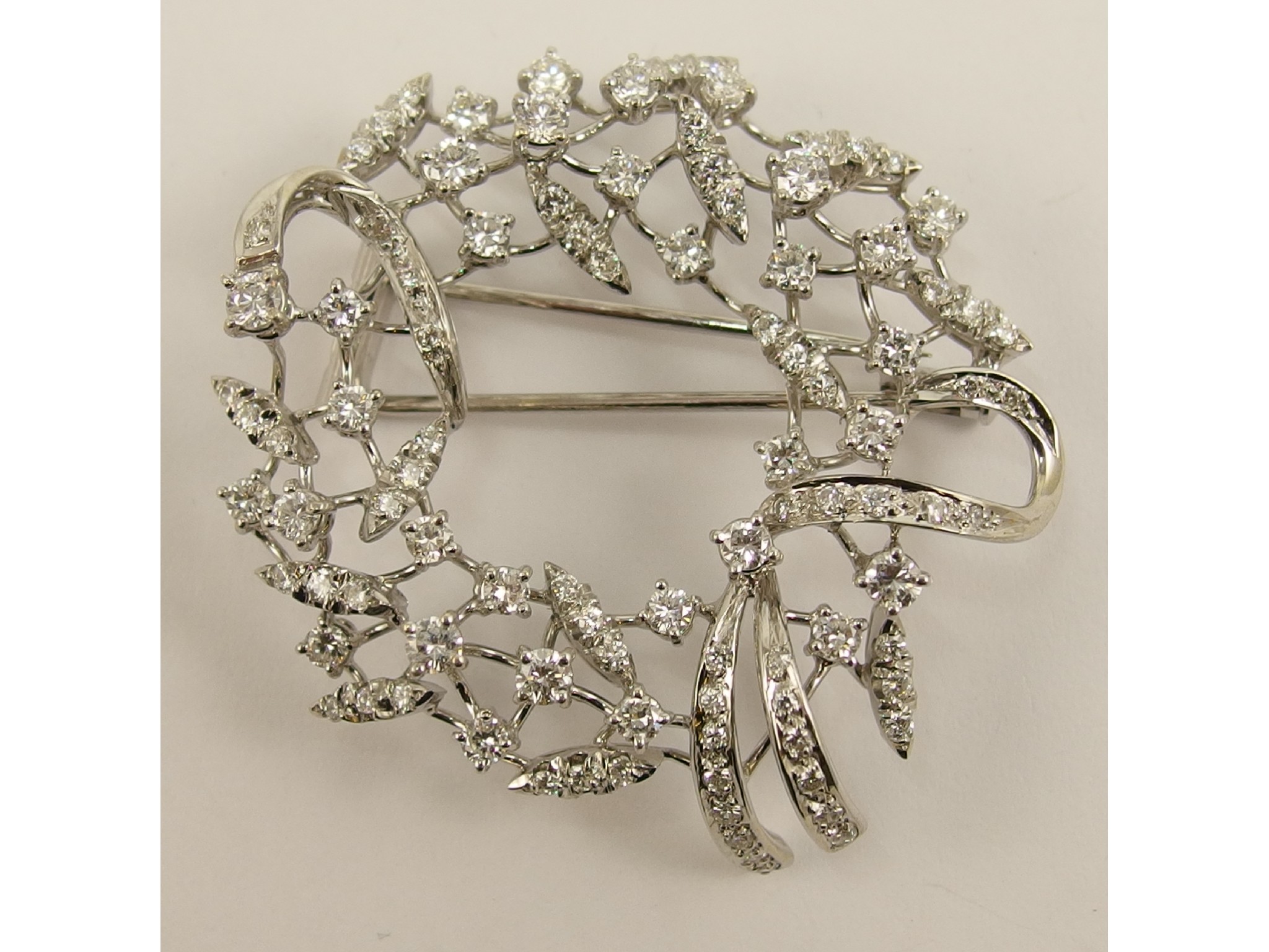 Appraisal: An ct white gold diamond flower garland broochset with brilliant